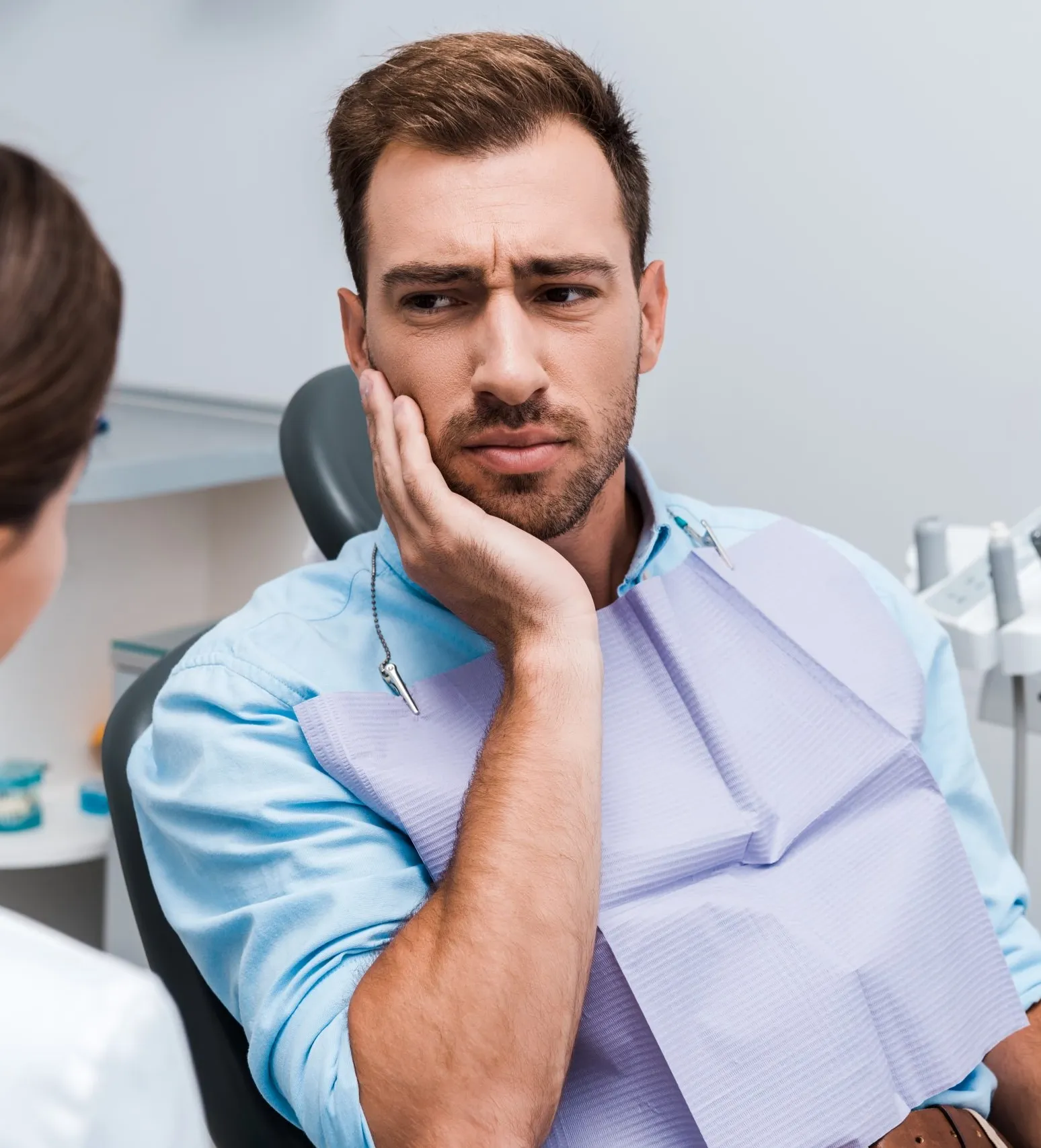 Patient experiencing tooth pain
